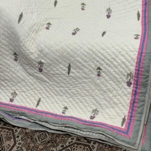 Block printed muslin quilt